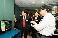 The visit to Joint Research Centre for Biomedical Engineering is introduced by Prof. Zhang Yuan-ting (1st from right), Director of the Centre.